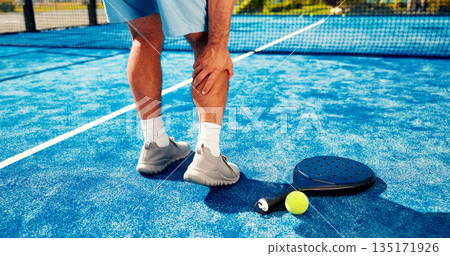 Hands, person and leg pain on padel court from fitness, match accident and muscle sprain. Player, discomfort and joint strain of exercise mistake, inflammation and sports injury for tennis tournament Hands, person and leg pain on padel court from fitness, match accident and muscle sprain. Player, discomfort and joint strain of exercise mistake, inflammation and sports injury for tennis tournament 135171926