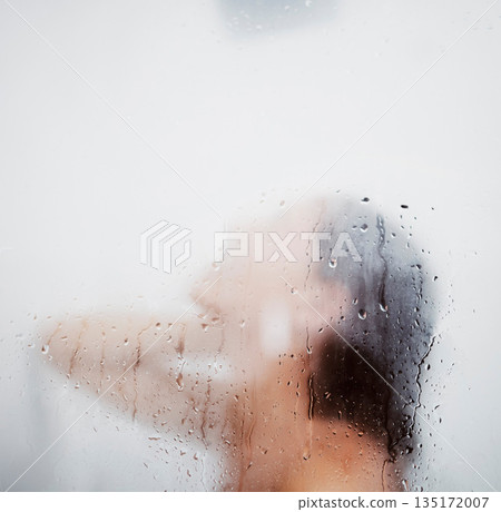 Shower glass, woman and hair wash for wellness, care and hygiene in a bathroom. Home, morning routine and cleaning with water and steam for skincare, grooming and washing in house with female person 135172007