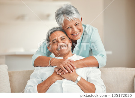 Senior couple, sofa and portrait with hug, smile and love in home living room with care, romance and happiness. Elderly man, old woman and embrace by lounge couch in retirement together in house Senior couple, sofa and portrait with hug, smile and love in home living room with care, romance and happiness. Elderly man, old woman and embrace by lounge couch in retirement together in house 135172030
