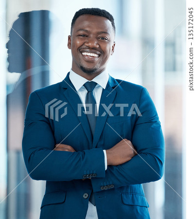 Businessman, portrait and happy executive with arms crossed or ceo, corporate manager and entrepreneur. Black man, face and professional company employee with pride, confidence or vision of business 135172045