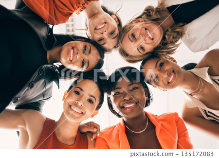 Diversity, circle and low angle portrait of businesswomen in a huddle at a team building meeting. Happy, confidence and group of professional female employees in collaboration bonding in the office. 135172083