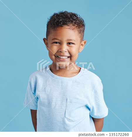 Happy, portrait and a child with a smile for dental care isolated on a blue background in a studio. Smile, kindergarten and a little boy kid smiling with happiness about young oral hygiene results Happy, portrait and a child with a smile for dental care isolated on a blue background in a studio. Smile, kindergarten and a little boy kid smiling with happiness about young oral hygiene results 135172260