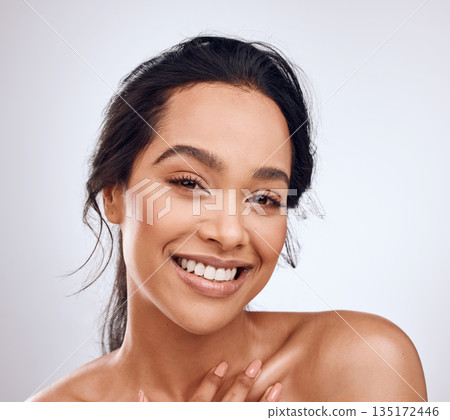 Beauty, makeup and portrait of woman isolated on a white background for happy skincare, cosmetics and glow or shine. Face of young studio model or person from Brazil in natural makeup or dermatology Beauty, makeup and portrait of woman isolated on a white background for happy skincare, cosmetics and glow or shine. Face of young studio model or person from Brazil in natural makeup or dermatology 135172446