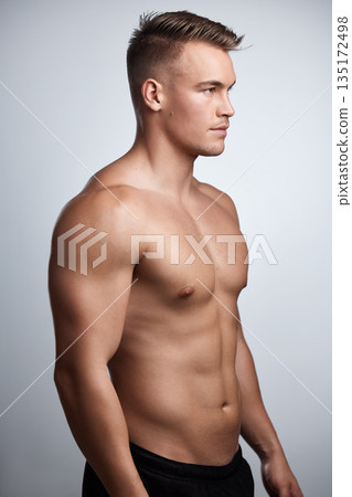Muscular, strong and man with abs on studio, background and backdrop with pride of sexy six pack. Bodybuilder, male model and topless sports athlete with muscle, fitness power and athletic confidence Muscular, strong and man with abs on studio, background and backdrop with pride of sexy six pack. Bodybuilder, male model and topless sports athlete with muscle, fitness power and athletic confidence 135172498