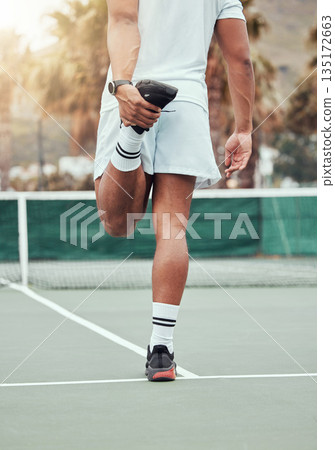 Man, hands and stretching legs on tennis court getting ready for match or game in the outdoors. Fit and active male person or sport player in warm up leg stretch for workout, exercise or training 135172663