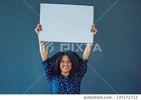 Poster, mockup and portrait of happy woman in studio with banner for news, social media or advertising on blue background. Space, sign and female smile with paper, board and branding promotion 135172712