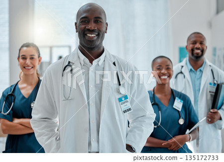 Happy, doctor and portrait of black man with team for medical help, insurance and trust in clinic. Healthcare, hospital and professional male and women health worker for service, consulting and care 135172733