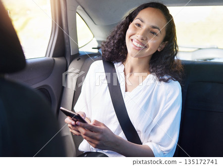 Smile, woman in backseat of taxi and phone for typing on mobile app for transport or gps location search. Travel service, commute and happy passenger in cab with cellphone for destination tracking. Smile, woman in backseat of taxi and phone for typing on mobile app for transport or gps location search. Travel service, commute and happy passenger in cab with cellphone for destination tracking. 135172741
