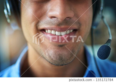 Happy man, teeth and smile in call center with headphones for customer service or telemarketing. Closeup of friendly male person or consultant agent mouth smiling with headset mic in contact us 135172784