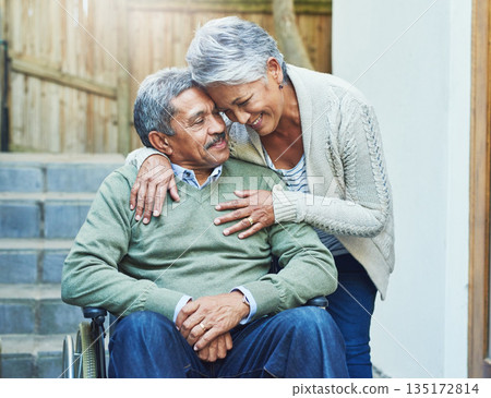 Support, wheelchair and senior couple hug with care, smile and love by elderly happy people in retirement. Old man, rehabilitation and person with disability and woman helping in empathy in marriage 135172814