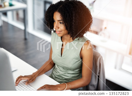 Smile, research and business woman on a computer in office from above, happy and satisfied with web search. Online, review and African female person smile for report, proposal or creative inspiration 135172823