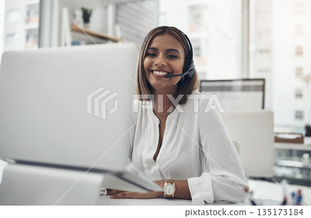 Smile, headset and portrait of a woman in a call center for customer service, telemarketing or help desk. Female person, consultant or agent with laptop for contact us, support or crm at a company 135173184
