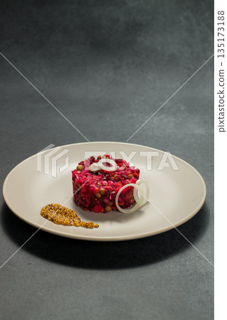 Classic Russian Beet Salad with Mustard Seeds on Plate. Vinaigrette Classic Russian Beet Salad with Mustard Seeds on Plate. Vinaigrette 135173188