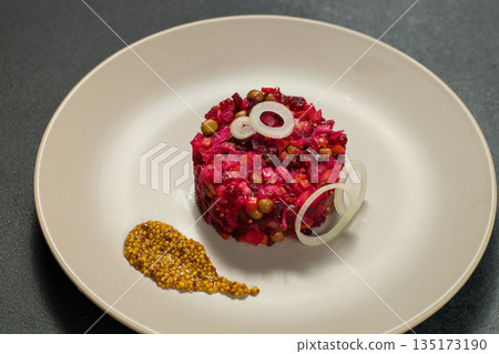 Classic Russian Beet Salad with Mustard Seeds on Plate. Vinaigrette Classic Russian Beet Salad with Mustard Seeds on Plate. Vinaigrette 135173190