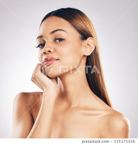 Young woman, skincare and beauty in portrait for health, wellness or facial glow by white background. Girl, model and healthy skin with youth, makeup or cosmetics for self care, aesthetic and studio 135173328