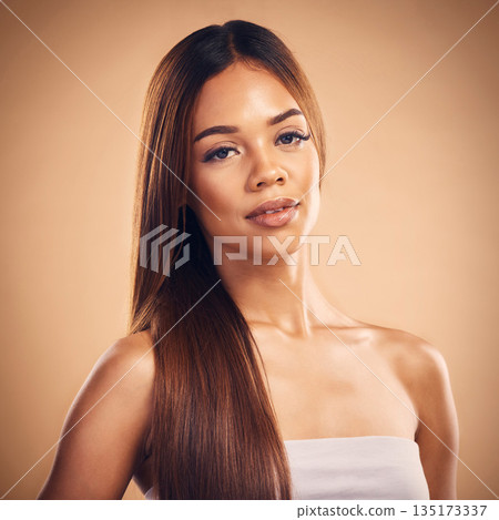 Woman, hair style and beauty in studio portrait with cosmetic wellness, glow and shine by brown background. Girl, latino model and haircare with makeup, health and cosmetics with growth by backdrop Woman, hair style and beauty in studio portrait with cosmetic wellness, glow and shine by brown background. Girl, latino model and haircare with makeup, health and cosmetics with growth by backdrop 135173337