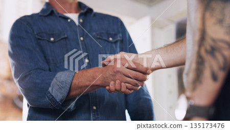 Handshake, meeting and teamwork with men in a workshop together for a deal or agreement. Partnership, welcome and greeting with male industry people shaking hands in a factory to gesture thank you Handshake, meeting and teamwork with men in a workshop together for a deal or agreement. Partnership, welcome and greeting with male industry people shaking hands in a factory to gesture thank you 135173476