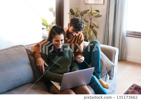 Laptop, credit card and happy couple on sofa, online shopping or cashback and spending in home. Smile, man and woman on couch to relax together, ecommerce or payment with bonding time and happiness. Laptop, credit card and happy couple on sofa, online shopping or cashback and spending in home. Smile, man and woman on couch to relax together, ecommerce or payment with bonding time and happiness. 135173662
