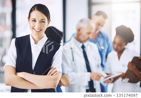 Healthcare, hospital and portrait of woman with arms crossed, smile and happiness with support in clinic. Health care, manager and medicine, confident and happy face of nurse or medical professional. Healthcare, hospital and portrait of woman with arms crossed, smile and happiness with support in clinic. Health care, manager and medicine, confident and happy face of nurse or medical professional. 135174097