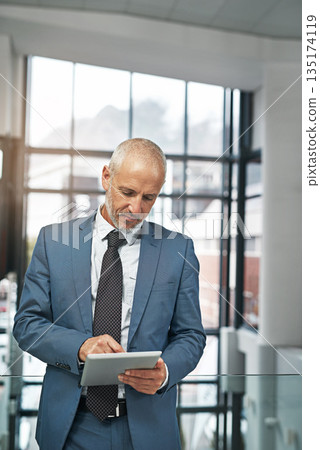 Tablet, focus and ceo with business man in office for networking, research and digital. Social media, internet and email with senior male employee for corporate, professional and communication Tablet, focus and ceo with business man in office for networking, research and digital. Social media, internet and email with senior male employee for corporate, professional and communication 135174119