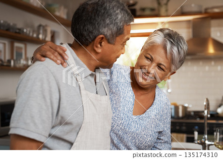 Kitchen, happiness and old man with woman, embrace and healthy marriage bonding in home for dinner. Love, help and cooking, senior couple with smile, hug in apartment and happy time in retirement. Kitchen, happiness and old man with woman, embrace and healthy marriage bonding in home for dinner. Love, help and cooking, senior couple with smile, hug in apartment and happy time in retirement. 135174310