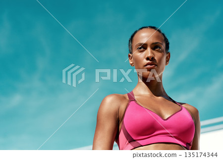 Sports, fitness and serious woman with blue sky mockup at outdoor gym for health and wellness. Workout, exercise and female athlete with focus, power and healthy mindset for summer goals with space. Sports, fitness and serious woman with blue sky mockup at outdoor gym for health and wellness. Workout, exercise and female athlete with focus, power and healthy mindset for summer goals with space. 135174344