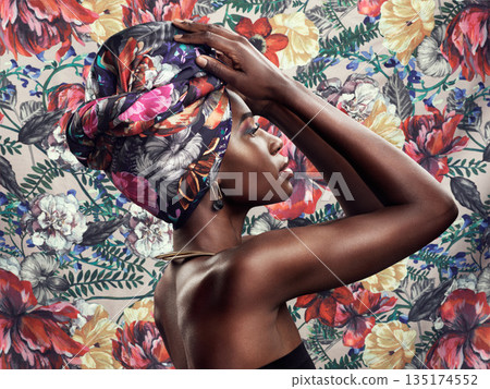 Fashion, beauty and black woman with scarf on flower background with glamour, cosmetics and makeup. Floral pattern, designer and face of female person in exotic jewelry, African style and head turban Fashion, beauty and black woman with scarf on flower background with glamour, cosmetics and makeup. Floral pattern, designer and face of female person in exotic jewelry, African style and head turban 135174552