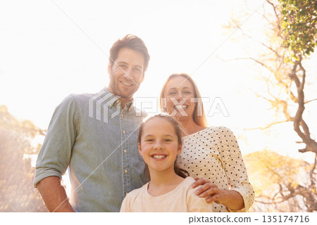 Nature, sunshine and happy portrait of family, parents and child support, bonding and enjoy outdoor quality time together. Sky, spring flare and happiness of mother, father or kid smile for love care Nature, sunshine and happy portrait of family, parents and child support, bonding and enjoy outdoor quality time together. Sky, spring flare and happiness of mother, father or kid smile for love care 135174716