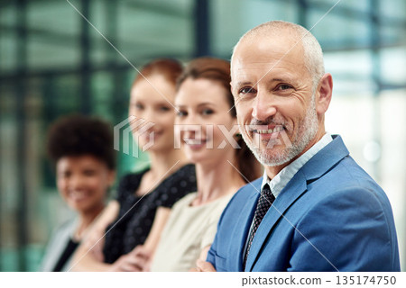 Portrait, happy man and leadership of corporate team in office for professional commitment, pride or trust. Face, mature boss and confident CEO with employees in business management, company or smile Portrait, happy man and leadership of corporate team in office for professional commitment, pride or trust. Face, mature boss and confident CEO with employees in business management, company or smile 135174750