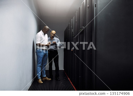 Server room, people or technicians with tablet for cybersecurity or internet glitch with teamwork. IT support help, collaboration or African engineers fixing network data for information technology 135174906
