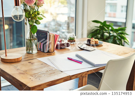 Book, desk and remote work in creative empty workplace with paper for writing, planning or idea inspiration. Notebook, space and workspace table for freelance business in home office creativity room Book, desk and remote work in creative empty workplace with paper for writing, planning or idea inspiration. Notebook, space and workspace table for freelance business in home office creativity room 135174953