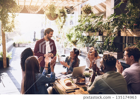 Applause, restaurant and business people in lunch meeting for discussion, planning and profit goal. Cafe, teamwork success and men and women clapping for winning, collaboration and achievement 135174963