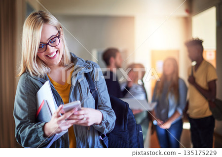 Phone, woman and student smile in university, texting and social media online. Cellphone, college and female person typing, web scroll or internet browsing, research and mobile app for communication. Phone, woman and student smile in university, texting and social media online. Cellphone, college and female person typing, web scroll or internet browsing, research and mobile app for communication. 135175229