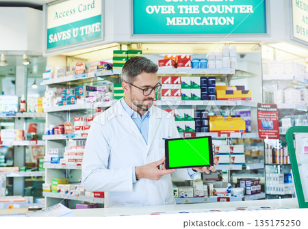 Man, pharmacist and tablet with green screen with health, store and mockup with pharmaceutical promo on app. Mature pharma expert, digital touchscreen and space with chromakey for mock up in shop Man, pharmacist and tablet with green screen with health, store and mockup with pharmaceutical promo on app. Mature pharma expert, digital touchscreen and space with chromakey for mock up in shop 135175250