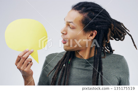 Young man, speech bubble and wow studio with voice, opinion and social media with by background. Gen z guy, poster and paper sign for vote, review or mock up with happiness for ideas, news or chat 135175519