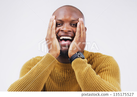 Excited, surprise and portrait of a man in studio with a winning, wow or omg facial expression. Happy, smile and face of African male model with shock to celebrate an achievement by white background. Excited, surprise and portrait of a man in studio with a winning, wow or omg facial expression. Happy, smile and face of African male model with shock to celebrate an achievement by white background. 135175527