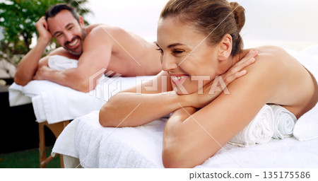 Spa, relax and happy couple outdoor for massage, vacation and resting on a table with zen. Love, peace and man with woman at a luxury resort for wellness, treatment and body therapy, smile or bonding Spa, relax and happy couple outdoor for massage, vacation and resting on a table with zen. Love, peace and man with woman at a luxury resort for wellness, treatment and body therapy, smile or bonding 135175586
