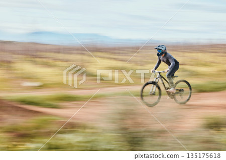 Fitness, adrenaline and man riding a bike in nature training for a race, marathon or competition. Sports, motion and male athlete biker practicing for an outdoor cardio exercise, adventure or workout 135175618