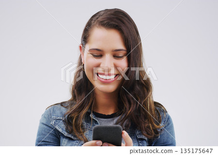 Smile, contact and woman with a phone, typing and social media on a white studio background. Female person, girl and model with a smartphone, connection and online reading with sms and website info Smile, contact and woman with a phone, typing and social media on a white studio background. Female person, girl and model with a smartphone, connection and online reading with sms and website info 135175647