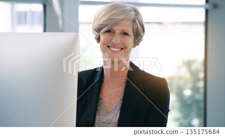 Portrait, computer and business woman, ceo or professional in office workplace. Face, glasses and smile of female executive, senior entrepreneur or director from Canada with success mindset for job. 135175684