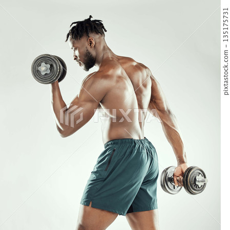Exercise, strong and black man with dumbbells, workout goal and healthy guy on a white studio background. Male person, model or bodybuilder with gym equipment, strength and power with muscle and body Exercise, strong and black man with dumbbells, workout goal and healthy guy on a white studio background. Male person, model or bodybuilder with gym equipment, strength and power with muscle and body 135175731