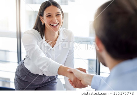 Female professional, welcome and shaking hands during a meeting at a company for collaboration. Business, woman and introduction at the office have a deal or an agreement for working with employer. Female professional, welcome and shaking hands during a meeting at a company for collaboration. Business, woman and introduction at the office have a deal or an agreement for working with employer. 135175778