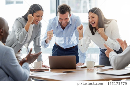 Success, businesspeople with celebration and in office of their workplace with a lens flare. Achievement or good news, happiness and colleagues happy celebrating or cheering at their workstation 135175779