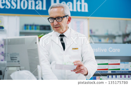 Pharmacy product, cash register and senior man process sale of pharmaceutical, supplements or pills box. Retail pharmacist, drug store medicine and medical person enter prescription package data 135175780