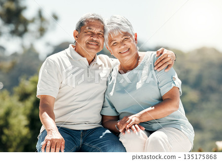 Senior couple, portrait and hug in nature on vacation, holiday or summer bonding. Face, hugging and retirement of man and woman with happiness, love or enjoying quality time together on date outdoor. Senior couple, portrait and hug in nature on vacation, holiday or summer bonding. Face, hugging and retirement of man and woman with happiness, love or enjoying quality time together on date outdoor. 135175868