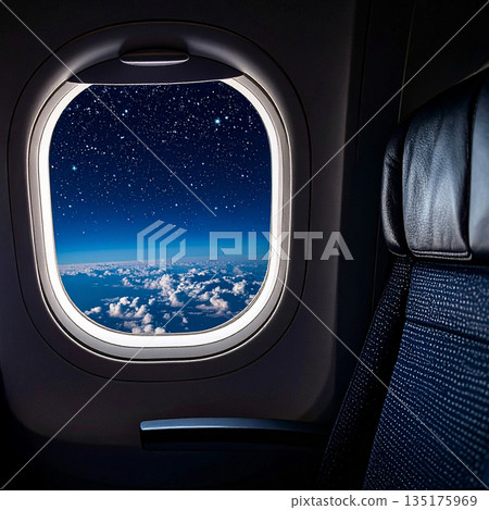 view of the starry sky at night from the airplane window 135175969