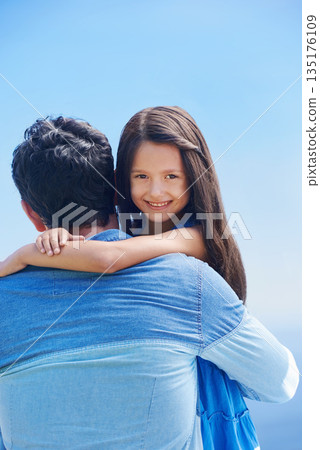 Hug, blue sky and happy portrait of father, child or family smile for outdoor freedom, wellness and enjoy quality time together. Support, love embrace and kid girl bonding with dad on Italy vacation 135176109