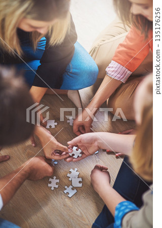 Top view, people and puzzle for teamwork, support and problem solving of challenge, synergy and cooperation. Group of hands planning jigsaw for integration, collaboration and solution for innovation Top view, people and puzzle for teamwork, support and problem solving of challenge, synergy and cooperation. Group of hands planning jigsaw for integration, collaboration and solution for innovation 135176256