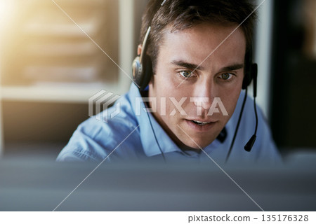 Telemarketing agent, focus and man consulting with advice, sales or help desk worker with headset. Phone call, conversation and customer support consultant, crm service agency listening on headphones Telemarketing agent, focus and man consulting with advice, sales or help desk worker with headset. Phone call, conversation and customer support consultant, crm service agency listening on headphones 135176328