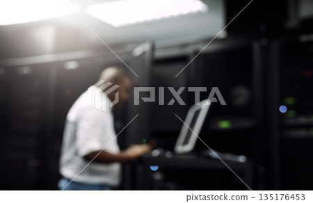 Code, black man or coding on computer in server room for big data, tech glitch or digital website. IT support, blurry or technician typing on laptop testing UX, programming or software development Code, black man or coding on computer in server room for big data, tech glitch or digital website. IT support, blurry or technician typing on laptop testing UX, programming or software development 135176453